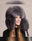 Women's fox fur trapper hat with earmuffs in Silver Blue – styled on model | Firelady Fur