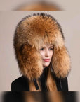 Women's fox fur trapper hat with earmuffs in Coffee – styled on model | Firelady Fur
