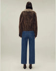 Back view of Firelady Fur Wander Free chestnut brown denim parka with detachable fur collar