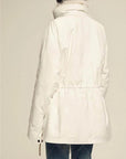 Back view of Firelady Fur Ode to the Stars white down parka with adjustable waist and Tokaj fur collar
