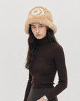 Woman styling a khaki rabbit fur knitted ethnic hat - Fireladyfur