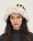 Woman wearing a milk tea rabbit fur knitted ethnic hat - Fireladyfur