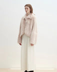 Pink Toscana shearling jacket showing straight short silhouette