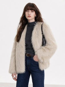 Model wearing Black Sugar Beige Apricot fox fur cardigan, front view