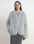 Model wearing Champagne Ice Blue SagaFurs fox fur coat, front view