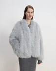 Champagne Ice Blue V-neck fox fur jacket, three-quarter model view