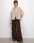 Darcy Manor wheat Toscana shearling short coat, full-length styling view
