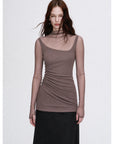 Pink brown double-layer transparent oblique collar fake two-piece knit top on EVA model front view
