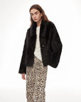 Dream Walk texture black Toscana wool coat, three-quarter styling view