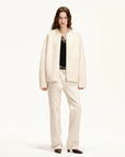 Ivory Merino shearling jacket with round neck and zip front