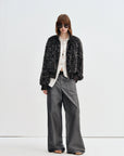 Model wearing Firelady Fur William Cream Frost rabbit fur knit jacket in Cloud White Black full length