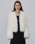 Model wearing Free Spirit Classic White short fox fur and leather coat