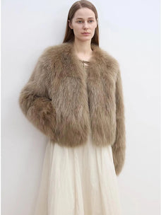 Model wearing Free Spirit Mocha short fox fur and leather coat
