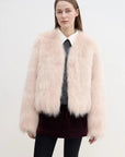 Model wearing Free Spirit Pink short fox fur and leather coat