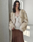 Gone with the Wind Apricot Brown fox fur coat in a natural-light setting