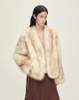 Model wearing Gone with the Wind Apricot Brown fox fur coat, front view