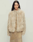 Model wearing Grace Champs-Élysées Beige fox fur coat, front view