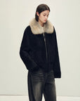 Model wearing Hokkaido Melody black short collar Merino shearling coat