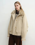 Khaki Letrans Silent Trace down parka with raccoon fur collar half front view