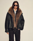 Model wearing Firelady Fur The Long Night Is Coming Black wolf fur down parka front view