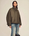 Model wearing Firelady Fur The Long Night Is Coming Greenish-Brown parka without fur collar