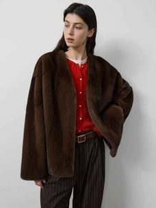 Model wearing Fireladyfur Louvre Coffee Natural mink V-neck jacket front view