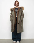 Fireladyfur Manchester City Old Stories II down parka seated styling