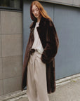 Model view of Mocha Phantom belted long shearling coat