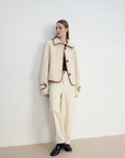 Off-white cropped Merino shearling jacket outfit, angled full-length view