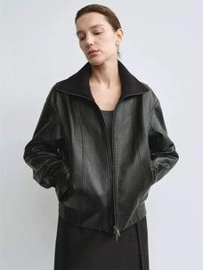 THE ARTM relaxed fit funnel neck leather jacket styled front view