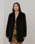 Moon Serenade Black mink coat on model, full-length front view