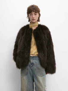 Model wearing Morning Mist Manor Dark Charcoal Gray fox fur coat
