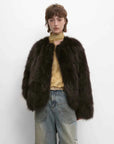 Model wearing Morning Mist Manor Dark Charcoal Gray fox fur coat