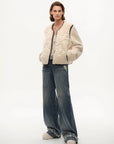 Model wearing the Muse Project embroidered Merino shearling coat, view 7