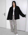 My Little Curly black Toscana shearling jacket on model, front view
