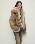 Three-quarter model view of Firelady Fur Nordic Woods Khaki raccoon fur down parka