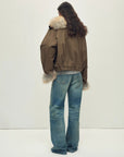 Back model view of Firelady Fur Nordic Woods Khaki cropped raccoon fur parka