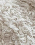 Peach Oolong Toscana shearling coat color and wool texture comparison