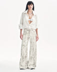 "Phantom" original snake print flared denim trousers - variant_title