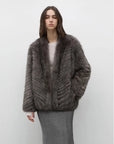 Model wearing Polar Night Star Gray Brown fox fur coat, front view