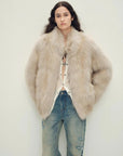 Model wearing Polar Snow Light Beige fox fur coat, front view