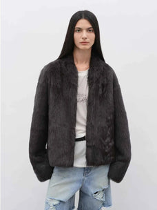 Model wearing the Practical Wearism ink gray Toscana sheepskin coat, front view