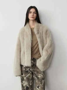 Model wearing the Practical Wearism wheat Toscana sheepskin coat, front view