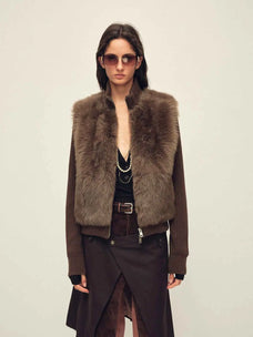 Model wearing the Silky Cocoa cocoa brown shearling coat with detachable sleeves