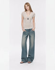 Flower Ash merino wool Tencel deep V-neck zipper short sleeve top on model full front view
