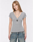 Khaki Gray merino wool Tencel deep V-neck zipper short sleeve top on model front view
