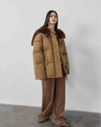 Full-length model view of Fireladyfur Street Badge Yellow Brown down parka with fox fur lapel