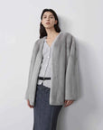 Swiss Snow Sapphire mink coat on model, front view