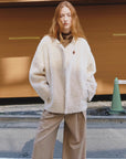 Urban Home off-white Merino shearling coat street style model view