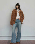 Vintage Clock Latte mink fur coat styled with wide-leg jeans